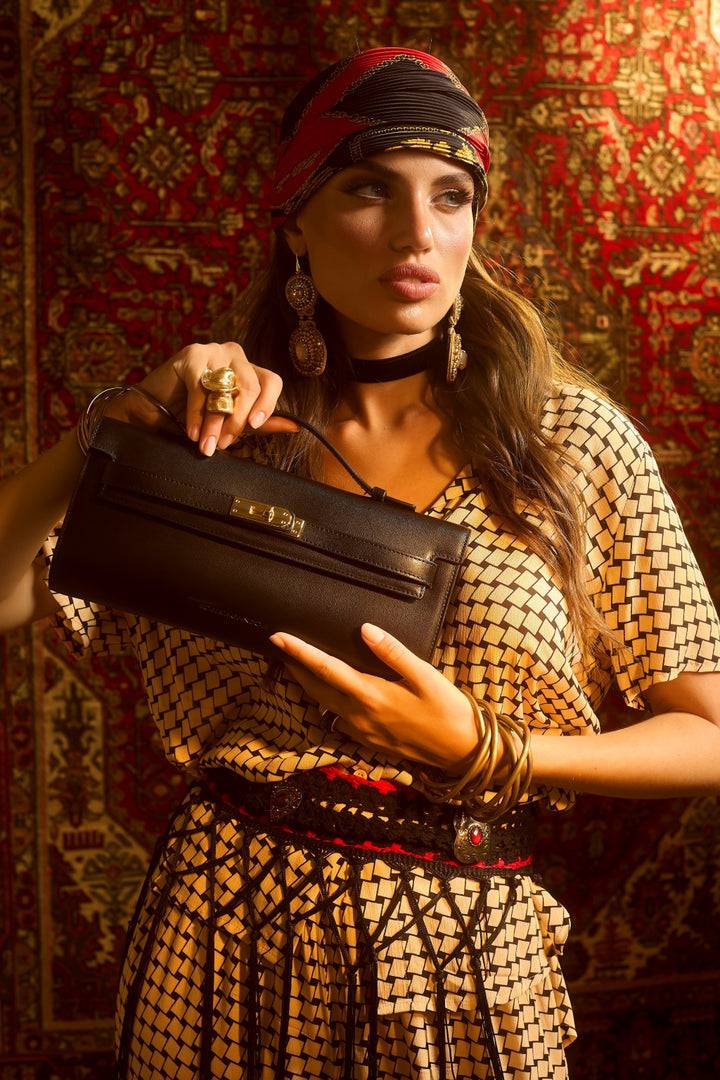 Roberta Gandolfi Jade cluch borsa in pelle con chiusura manico retrattile e tracolla staccabile e regolabile Vendita