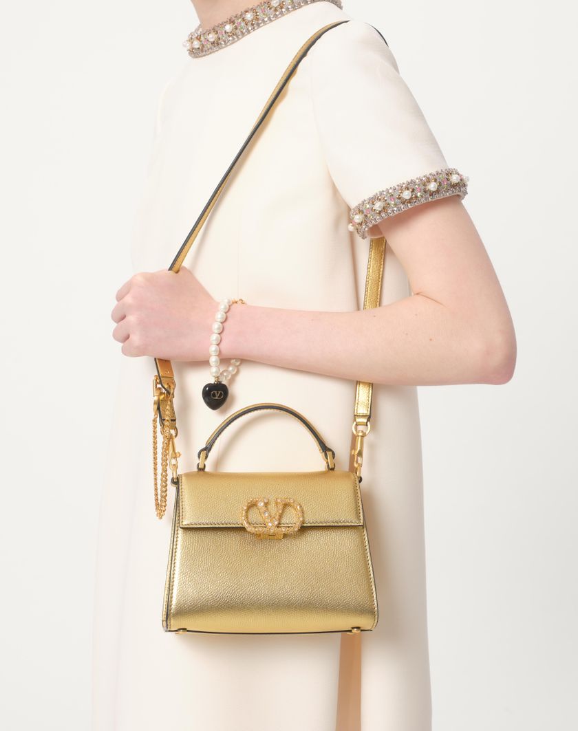 Valentino Handbags Borsa A Mano Mini Valentino Garavani Vsling In Vitello Granato Laminato Con Logo Gioiello per Donna in Antique Brass | Valentino IT Sconto