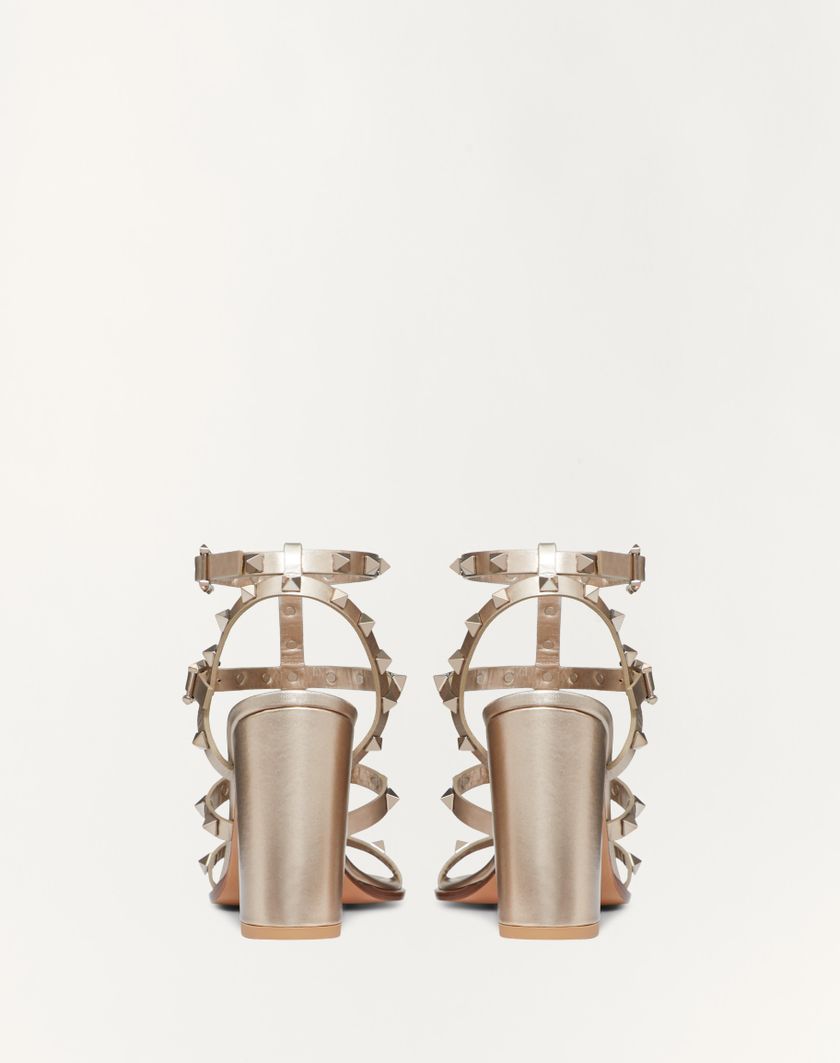 Valentino Handbags Sandalo Rockstud In Vitello Metallizzato Con Cinturini 90mm per Donna in Skin | Valentino IT 2025