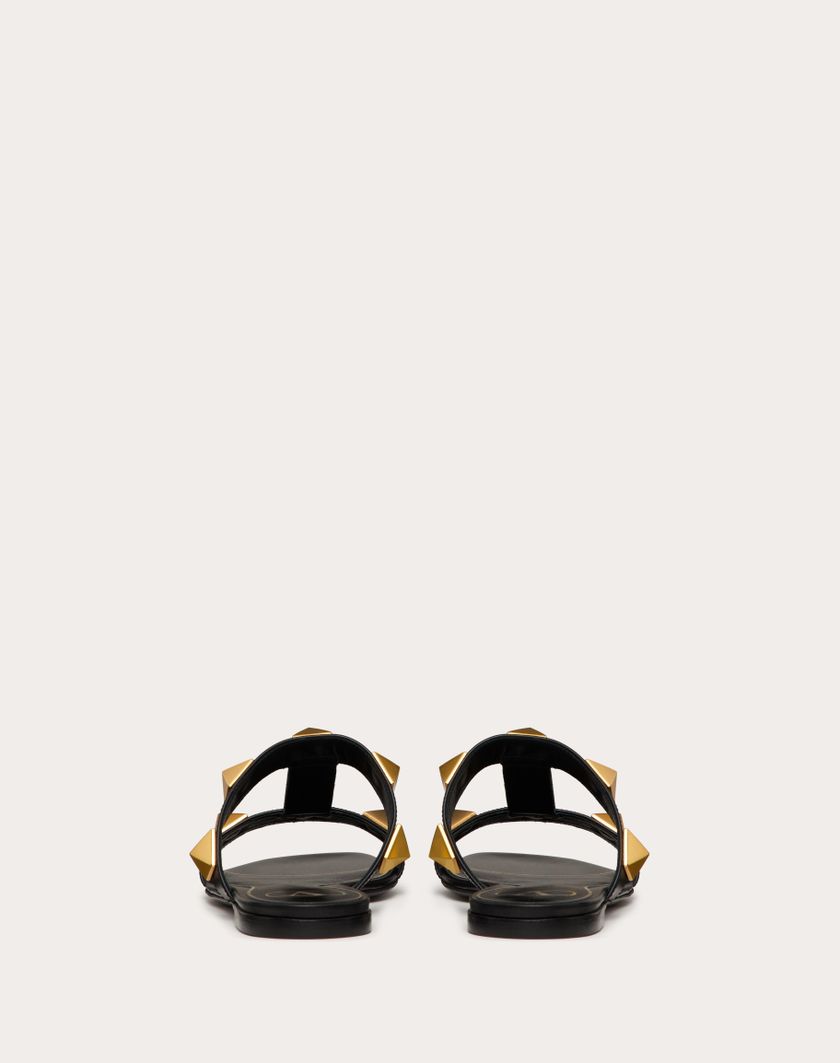 Valentino Handbags Sandalo Slide Basso Roman Stud In Vitello per Donna in Nero | Valentino IT Offerta per la Festa della Mamma