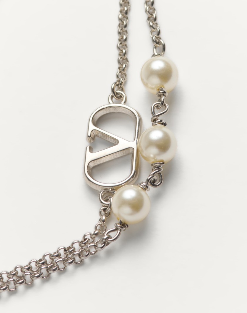 Valentino Handbags Bracciale Vlogo Signature In Metallo E Perle Swarovski® per Donna in Palladio/crystal | Valentino IT Liquidazione